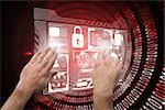 Hands pointing and presenting against shiny red binary code on black background