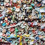 Close up of chewed bubble gum stuck on The Gum Wall in Pike Place market in Seattle.