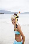 A young woman wearing snorkelling gear on the Samana Peninsula in the Dominican Republic.