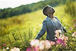 Woman Enjoying Organic Flower Farm