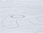 Tyre marks and tracks in the playa salt pan surface of Black Rock Desert, Nevada.