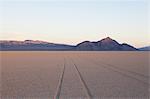 Tyre marks and tracks in the playa salt pan surface of Black Rock Desert, Nevada.