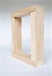 A box shape, four pieces of wood fitted together. Spruce treated  2x4 wood studs, creating a square frame.