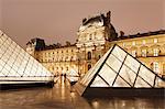 Illuminated Louvre Museum and Pyramid at night, Paris, Ile de France, France, Europe