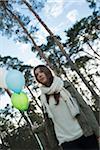 Young Woman with Balloons Outdoors, Mannheim, Baden-Wurttemberg, Germany