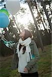 Young Woman with Balloons Outdoors, Mannheim, Baden-Wurttemberg, Germany