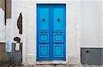 the front door of the old, dirty house