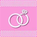 Pink card with white wedding rings with shadow
