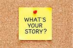 What's Your Story, written on an yellow sticky note pinned on a cork bulletin board.