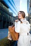 Young attractive girl with shopping bags