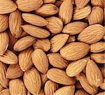 heap of almond nuts, close up photo