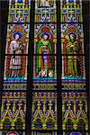 Stained glass in the St. Vitus Cathedral in Prague. Is a Roman Catholic cathedral