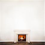 Luxurious White Marble Fireplace and empty wall for your text, logo, images, etc