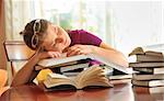 teenager girl sleeping on books, shoot in studio