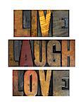 The words LIVE LAUGH LOVE written in vintage letterpress type