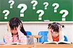 two kids is full of questions in class