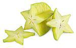 Carambola or starfruit with slices isolated on white background