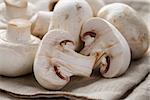 fresh white champignon on wood table, rustic style photo