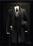 Mannequin with Men's Jacket, Bowler Hat, Scarf and Umbrella
