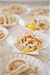 Close-up of Calamari Appetizers in Shell-shaped Dishes