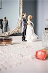 Wedding figurines on dressing table