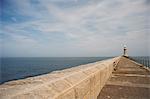 Harbour wall and lighthouse, Tynemouth, Tyne and Wear, United Kingdom