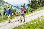 Parents and daughter hiking, Tyrol, Austria