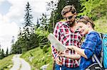 Couple with map, Tyrol, Austria