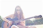 Teenager playing guitar