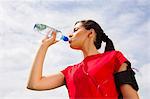 Jogger having drink of water