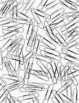 A large group of metal paperclips on a white background.