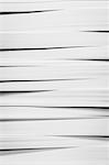 A stack of recycled white paper, paper supplies.