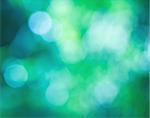 Blurred lights green bokeh abstract light background