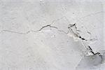 Grunge texture of the old and damaged stucco - plaster - fine cracks