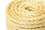 Roll of hemp rope close up on white background