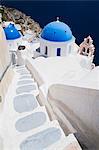 Church with blue dome with view of the Aegean Sea, Oia, Santorini, Cyclades, Greek Islands, Greece, Europe