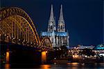Cologne cathedral, UNESCO World Heritage Site, and Hohenzollern bridge at dusk, Cologne, Germany, Europe