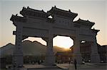 Sunset at the entrance gate to Shaolin temple, birthplace of Kung Fu martial art, Shaolin, Henan Province, China, Asia
