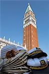 Souvenir hats for sale in front of the Campanile in Piazza San Marco, Venice, UNESCO World Heritage Site, Veneto, Italy, Europe
