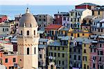 Santa Margherita Church and colourful buildings at dusk, Vernazza, Cinque Terre, UNESCO World Heritage Site, Liguria, Italy, Mediterranean, Europe