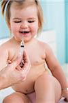 Portrait of Baby Girl about to get Needle at Doctor's Office