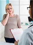 Doctor with Patient in Doctor's Office