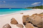 Sailboat in Ocean off Petit Anse Beach, La Digue, Seychelles