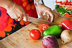 Woman chopping vegetables