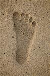 Footprint on sand, close-up