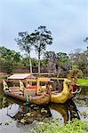 Ornate tourist boats near the South Gate at Angkor Thom, Angkor, UNESCO World Heritage Site, Siem Reap Province, Cambodia, Indochina, Southeast Asia, Asia