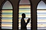 African reading the Bible in a church. Lome. Togo.