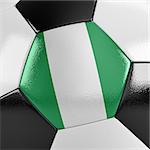 Close up view of a soccer ball with the Nigerian flag on it
