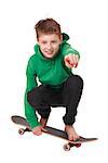 Portrait of a teenage boy with skateboard on white background