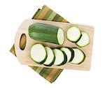 Zucchini on cutting board. Isolated on white background